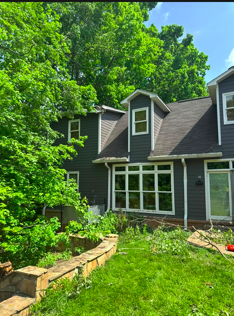 Clean, cleared property after professional emergency tree removal in Knoxville